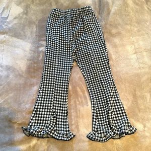 Girl’s black and white checked pants